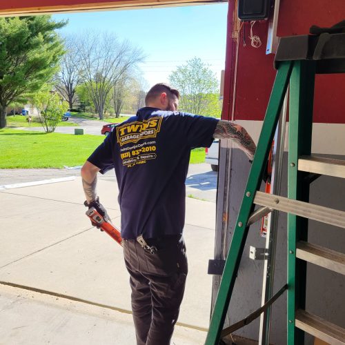 garage door tech measuring garage door track