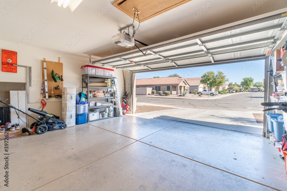 open garage door connected to an opener, inside view