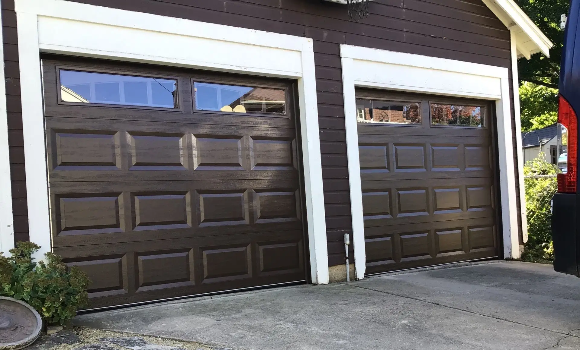 chocolate garage doors with windows