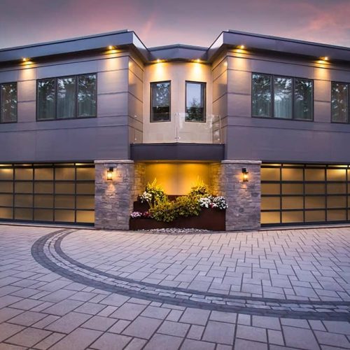 glass garage doors on modern house