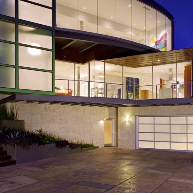 modern house with glass garage doors
