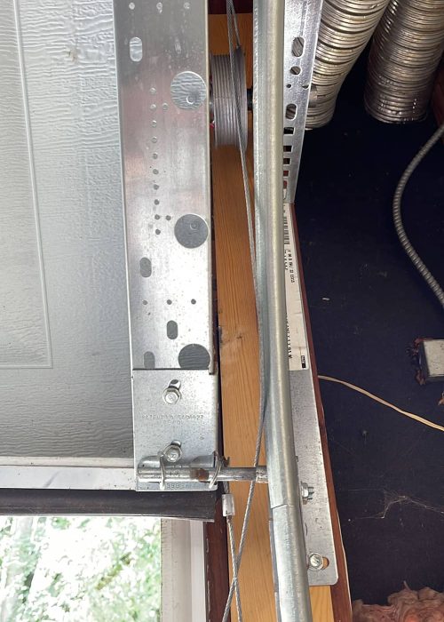 unwound garage door cable
