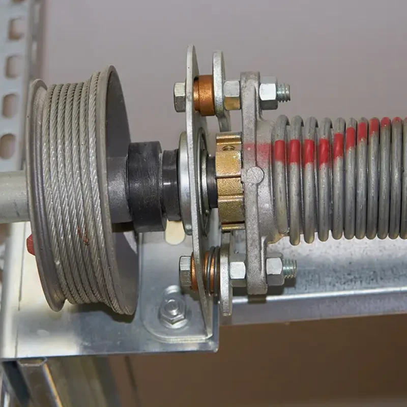 garage door mechanism with roller and cable and spring