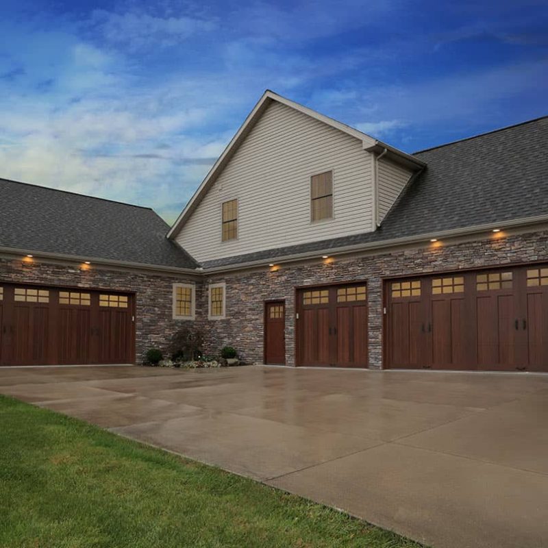 house with brown garage doors, overlay, wooden