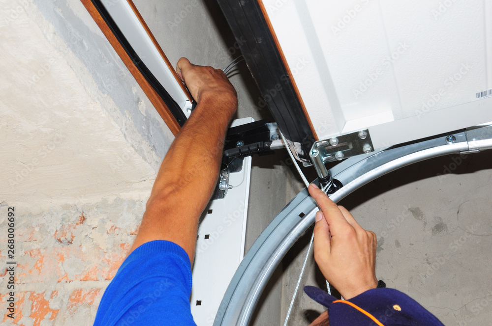 Can A Garage Door Be Repaired In Cold Weather? 2 Spring Repair 268006692