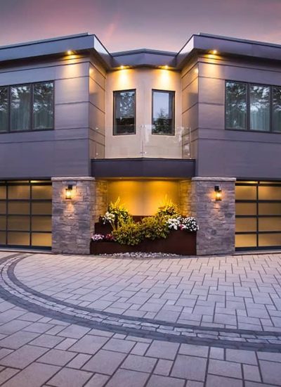 Avante house with brown and black garage doors